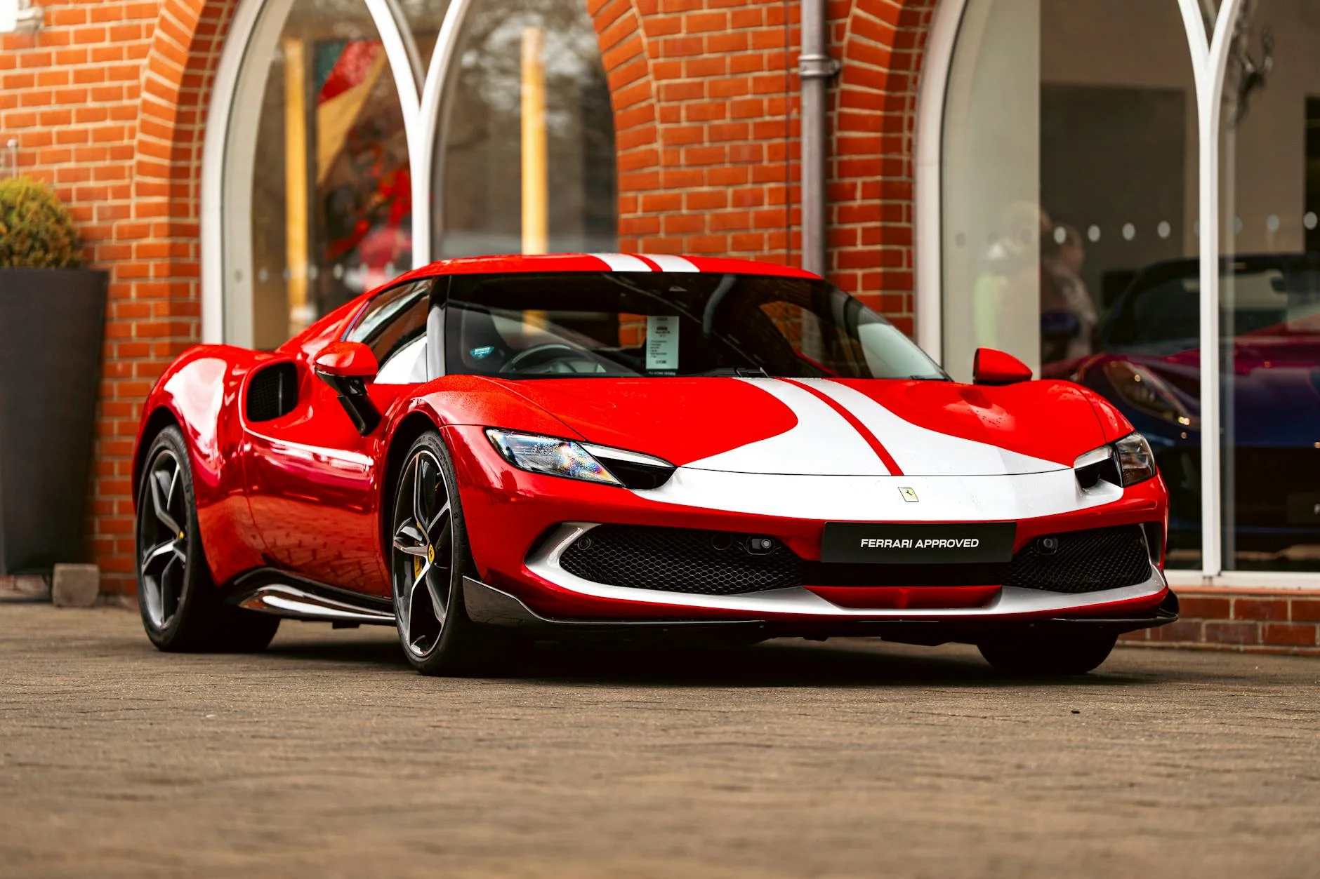 luxury sports car Ferrari Lamborghini dealership showroom