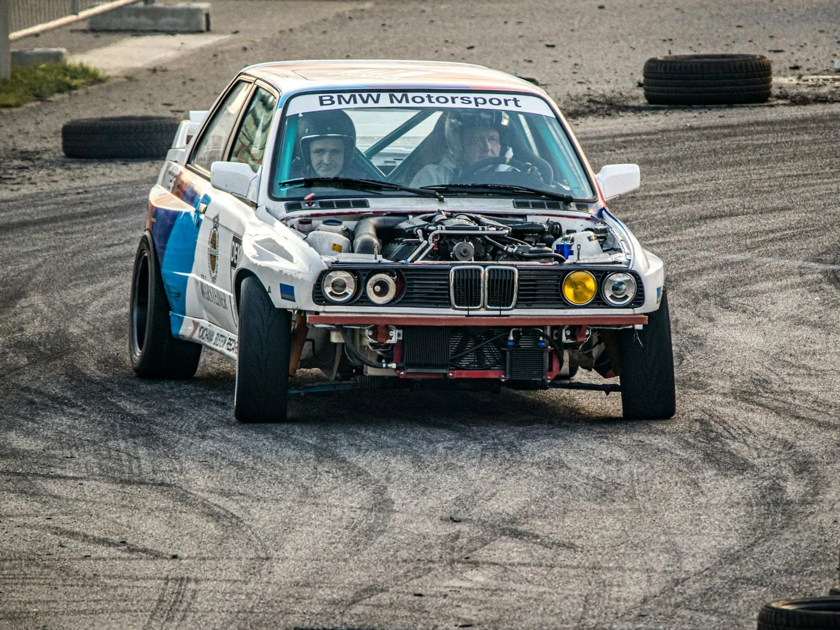 racing car tire grip asphalt track motorsport close up