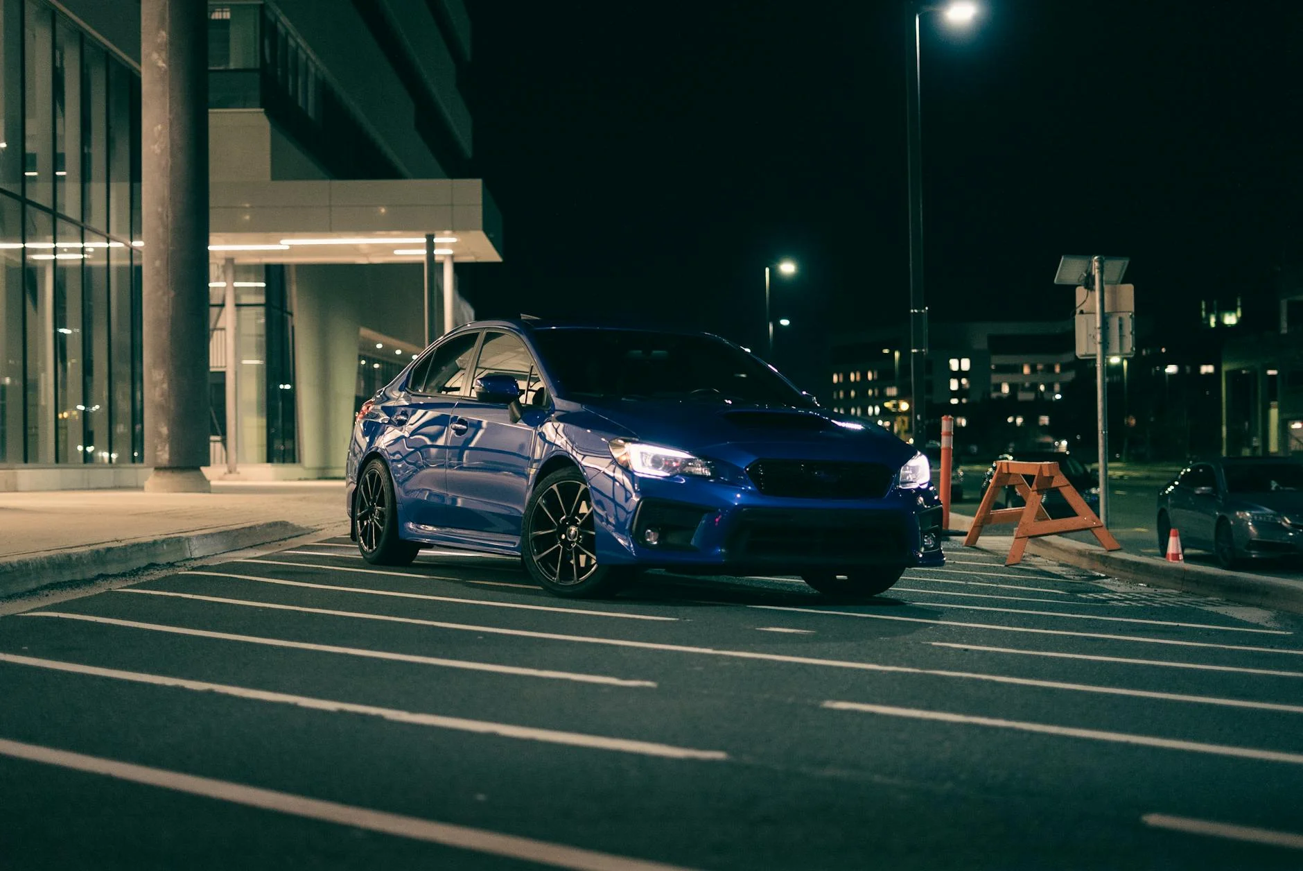 sports car neon lights night photography urban street reflection