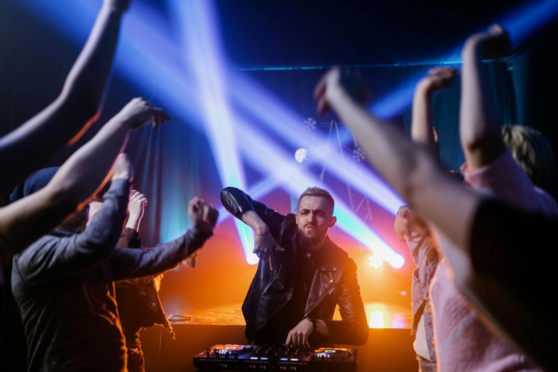 electronic music DJ concert nightclub neon lights