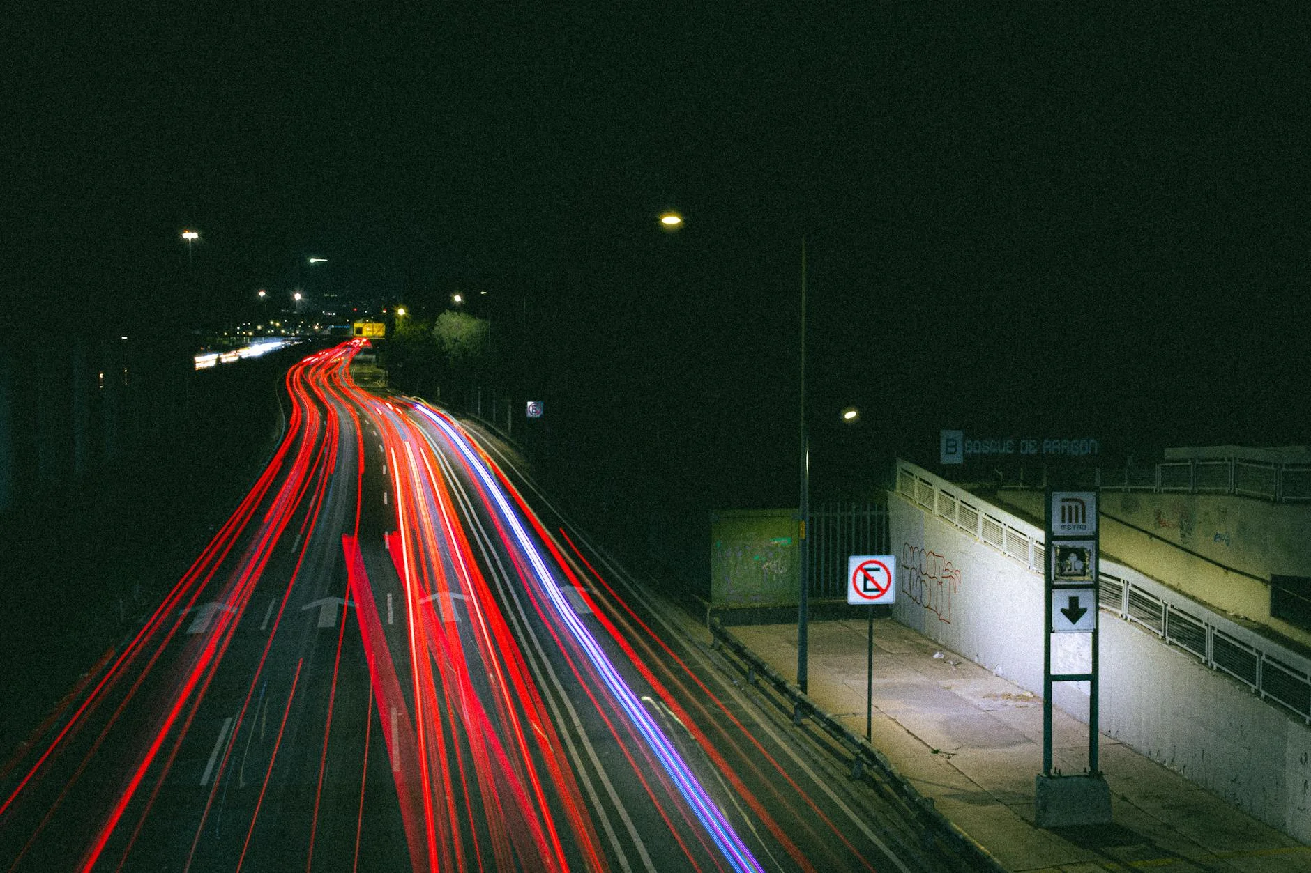 night highway empty road dark atmosphere neon lights city