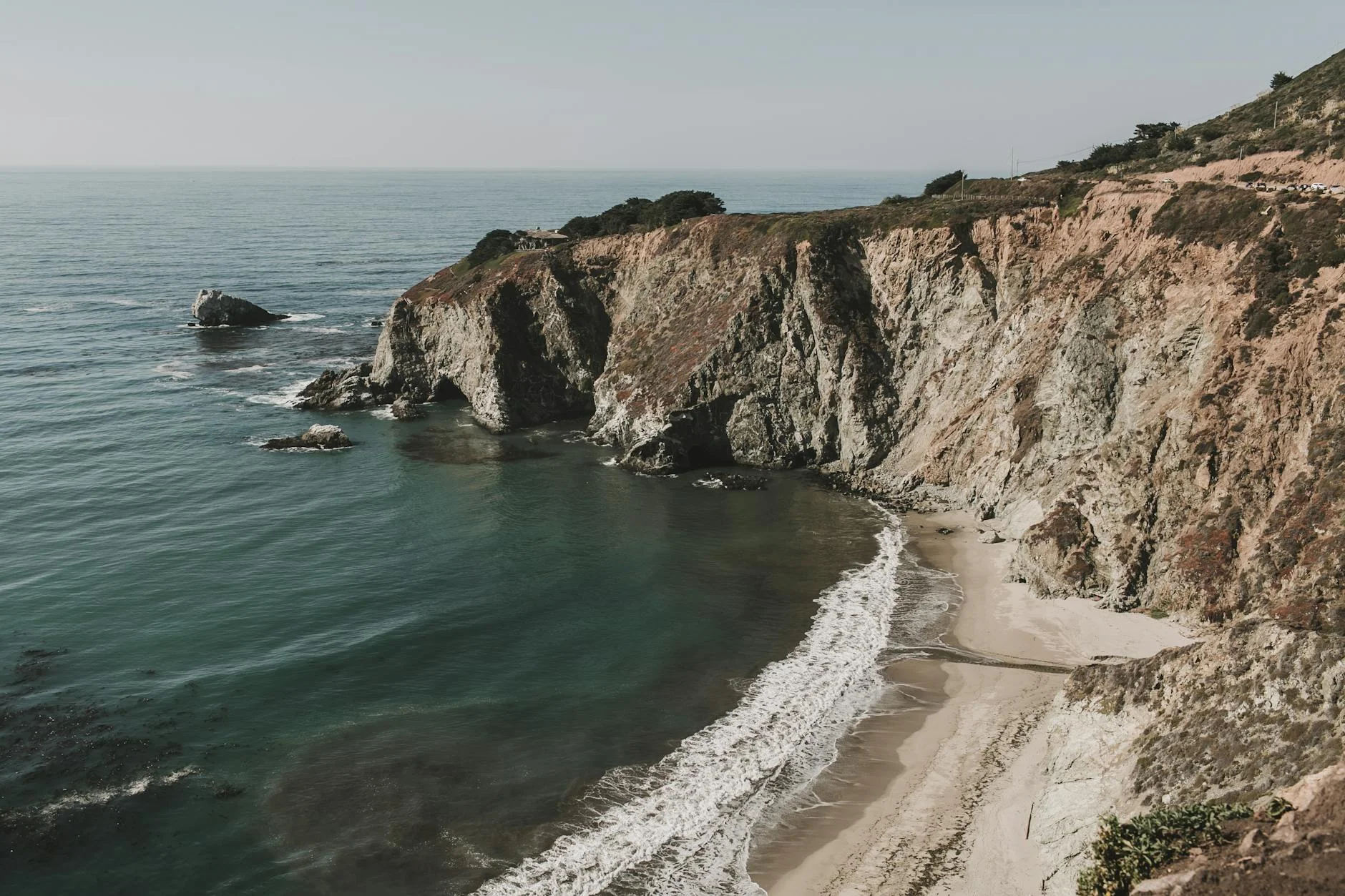 Pacific Coast Highway California winding road sunset cliffs ocean